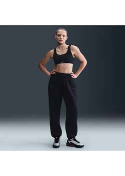 Damskie spodnie piłkarskie o kroju oversize z wysokim stanem Nike Anglia Phoenix Fleece - Czerń ze sklepu Nike poland w kategorii Spodnie damskie - zdjęcie 184006965