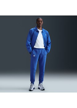 Męskie joggery piłkarskie Nike Anglia Club - Niebieski ze sklepu Nike poland w kategorii Spodnie męskie - zdjęcie 184007026