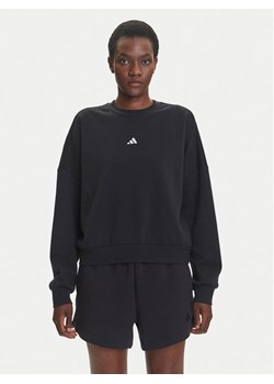 adidas Bluza Essentials Small Logo Feelcozy JC5932 Czarny Loose Fit ze sklepu MODIVO w kategorii Bluzy damskie - zdjęcie 184009926
