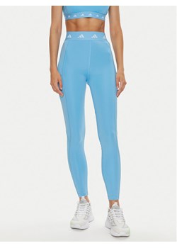 adidas Legginsy Techfit Stash IU1864 Błękitny Slim Fit ze sklepu MODIVO w kategorii Spodnie damskie - zdjęcie 184016106