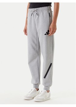 adidas Spodnie dresowe Z.N.E. JD9586 Szary Regular Fit ze sklepu MODIVO w kategorii Spodnie damskie - zdjęcie 184019258