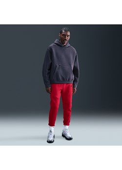 Męskie dzianinowe joggery Nike Tech - Czerwony ze sklepu Nike poland w kategorii Spodnie męskie - zdjęcie 184024696