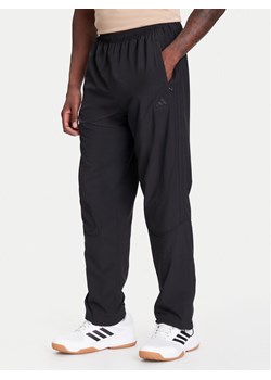 adidas Spodnie dresowe Teamgeist adicolor KA0596 Czarny Loose Fit ze sklepu MODIVO w kategorii Spodnie męskie - zdjęcie 184038417