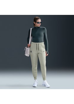 Damskie joggery piłkarskie z dzianiny ze średnim stanem Chelsea F.C. Tech - Zieleń ze sklepu Nike poland w kategorii Spodnie damskie - zdjęcie 184044166