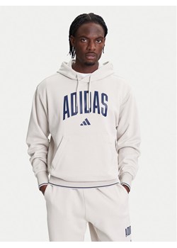 adidas Bluza Collegiate KC3872 Beżowy Regular Fit ze sklepu MODIVO w kategorii Bluzy męskie - zdjęcie 184045528