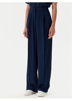 Tommy Hilfiger Spodnie materiałowe WW0WW46749 Granatowy Relaxed Fit ze sklepu MODIVO w kategorii Spodnie damskie - zdjęcie 184045595
