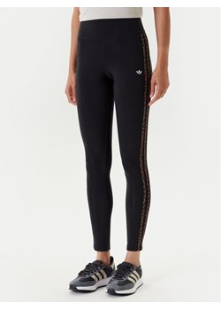 adidas Legginsy Leopard 3-Stripes JW7307 Czarny Slim Fit ze sklepu MODIVO w kategorii Spodnie damskie - zdjęcie 184045596