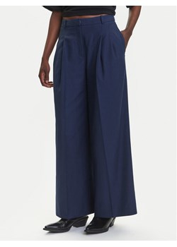 HUGO Spodnie materiałowe Harenau 50542606 Granatowy Relaxed Fit ze sklepu MODIVO w kategorii Spodnie damskie - zdjęcie 184045606