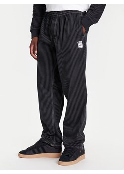 adidas Spodnie dresowe Wabash JP4489 Czarny Loose Fit ze sklepu MODIVO w kategorii Spodnie męskie - zdjęcie 184045848