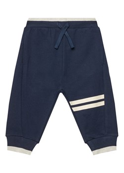 United Colors Of Benetton Spodnie dresowe 3BC1GF04O Granatowy Regular Fit ze sklepu MODIVO w kategorii Spodnie chłopięce - zdjęcie 184058165