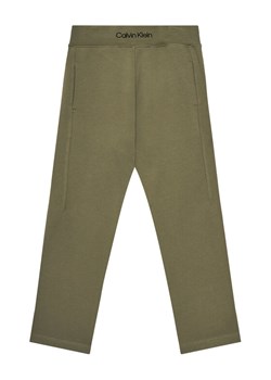 Calvin Klein Jeans Spodnie dresowe IB0IB02538 M Zielony Regular Fit ze sklepu MODIVO w kategorii Spodnie chłopięce - zdjęcie 184098328