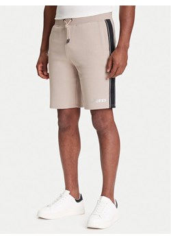 Guess Szorty sportowe Z4RD04 KB3P2 Beżowy Regular Fit ze sklepu MODIVO w kategorii Spodenki męskie - zdjęcie 184158625