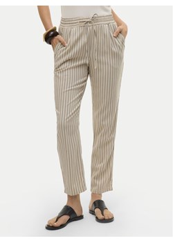 Vero Moda Spodnie materiałowe Jesmilo 10279691 Beżowy Regular Fit ze sklepu MODIVO w kategorii Spodnie damskie - zdjęcie 184187386