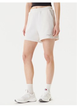 Tommy Jeans Szorty sportowe Linear DW0DW21152 Écru Relaxed Fit ze sklepu MODIVO w kategorii Szorty - zdjęcie 184197149