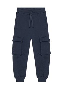 United Colors Of Benetton Spodnie dresowe 3UNICF066 Granatowy Regular Fit ze sklepu MODIVO w kategorii Spodnie chłopięce - zdjęcie 184199627