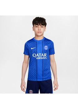 Przedmeczowa koszulka piłkarska z krótkim rękawem dla dużych dzieci Nike Dri-FIT Paris Saint-Germain Academy Pro (wersja domowa) - Niebieski ze sklepu Nike poland w kategorii T-shirty chłopięce - zdjęcie 184204045