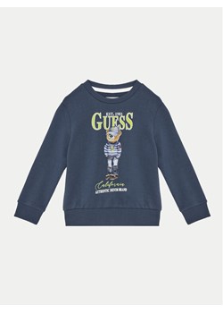Guess Bluza N5RQ05 KAD74 Granatowy Regular Fit ze sklepu MODIVO w kategorii Bluzy chłopięce - zdjęcie 184204665