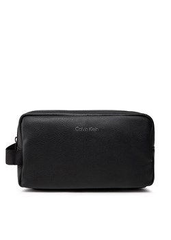 Kosmetyczka Calvin Klein Warmth Washbag K50K507347 Czarny ze sklepu eobuwie.pl w kategorii Kosmetyczki - zdjęcie 184206517