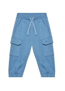 United Colors Of Benetton Spodnie dresowe 3UNIGF045 Niebieski Regular Fit ze sklepu MODIVO w kategorii Spodnie chłopięce - zdjęcie 184233527