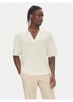 Tommy Hilfiger Polo F1 Movie MW0MW41384 Beżowy Regular Fit ze sklepu MODIVO w kategorii T-shirty męskie - zdjęcie 184235088