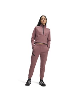 Damskie spodnie dresowe Under Armour Unstoppable Flc Jogger 1379846 - różowy ze sklepu Sportstylestory.com w kategorii Spodnie damskie - zdjęcie 184237025