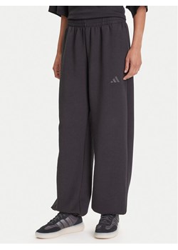 adidas Spodnie dresowe ALL SZN Soft Lux lJM1652 Czarny Loose Fit ze sklepu MODIVO w kategorii Spodnie damskie - zdjęcie 184253188
