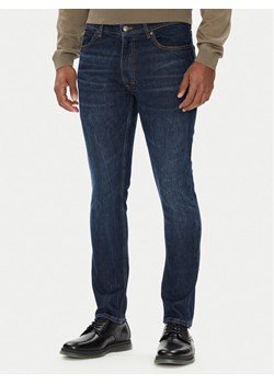 HUGO Jeansy HUGO 734 50542696 Granatowy Extra Slim Fit ze sklepu MODIVO w kategorii Jeansy męskie - zdjęcie 184255839