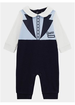 Guess Pajac P4RG11 KA6W4 Niebieski Regular Fit ze sklepu MODIVO w kategorii Pajacyki - zdjęcie 184261638
