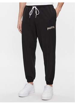 Puma Spodnie dresowe Team 538261 Czarny Relaxed Fit ze sklepu MODIVO w kategorii Spodnie męskie - zdjęcie 184261645