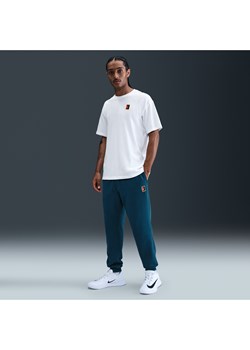 Męskie dzianinowe joggery do tenisa Dri-FIT NikeCourt Heritage - Niebieski - id: 41646248293new - marki Nike - 184264315 Męskie dzianinowe joggery do tenisa Dri-FIT NikeCourt Heritage - Niebieski ze sklepu Nike poland w kategorii Spodnie męskie - zdjęcie 184264315