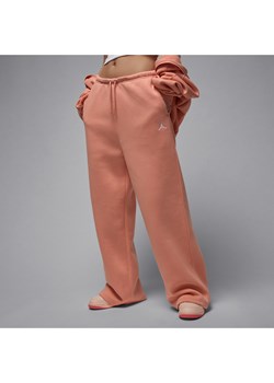 Damskie spodnie z luźnymi nogawkami Jordan Brooklyn Fleece - Pomarańczowy ze sklepu Nike poland w kategorii Spodnie damskie - zdjęcie 184264797