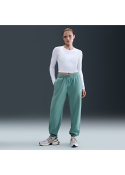 Damskie spodnie dresowe o kroju oversize z wysokim stanem Nike Sportswear Phoenix Fleece - Zieleń ze sklepu Nike poland w kategorii Spodnie damskie - zdjęcie 184264806
