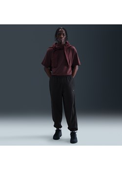 Męskie spodnie z dzianiny ze ściągaczami Nike Solo Swoosh - Czerń ze sklepu Nike poland w kategorii Spodnie męskie - zdjęcie 184265009