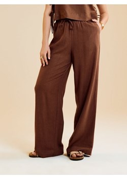 Sinsay - Spodnie wide leg z wiskozą i domieszką lnu - brązowy - id: 661FJ-84X - marki Sinsay - 184276858 Sinsay - Spodnie wide leg z wiskozą i domieszką lnu - brązowy ze sklepu Sinsay w kategorii Spodnie damskie - zdjęcie 184276858