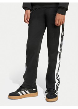 adidas Spodnie dresowe Adibreak JX1091 Czarny Regular Fit ze sklepu MODIVO w kategorii Spodnie chłopięce - zdjęcie 184282546