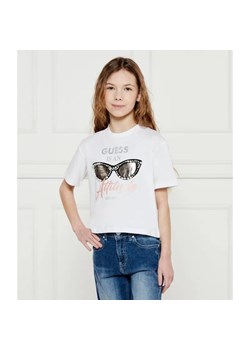 Guess T-shirt | Regular Fit ze sklepu Gomez Fashion Store w kategorii Bluzki dziewczęce - zdjęcie 184297718