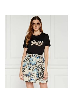 GUESS T-shirt GLITTERY LOGO | Regular Fit ze sklepu Gomez Fashion Store w kategorii Bluzki damskie - zdjęcie 184326577
