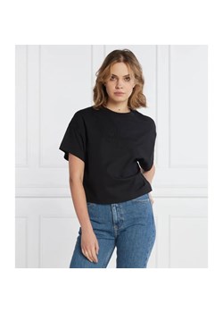 Calvin Klein Jeans T-shirt EMBOSSED MONOLOGO | Oversize fit ze sklepu Gomez Fashion Store w kategorii Bluzki damskie - zdjęcie 184328698