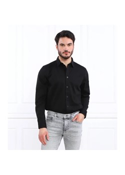 Calvin Klein Jeans Koszula MONOLOGO BADGE | Relaxed fit ze sklepu Gomez Fashion Store w kategorii Koszule męskie - zdjęcie 184330036