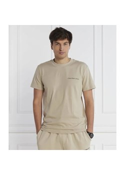 Calvin Klein Jeans T-shirt LOGO TAPE | Regular Fit ze sklepu Gomez Fashion Store w kategorii T-shirty męskie - zdjęcie 184339458