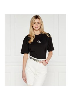 Calvin Klein Jeans T-shirt MONOLOGO | Regular Fit ze sklepu Gomez Fashion Store w kategorii Bluzki damskie - zdjęcie 184344058