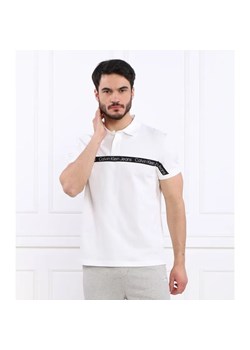 Calvin Klein Jeans Polo LOGO TAPE | Regular Fit ze sklepu Gomez Fashion Store w kategorii T-shirty męskie - zdjęcie 184355425