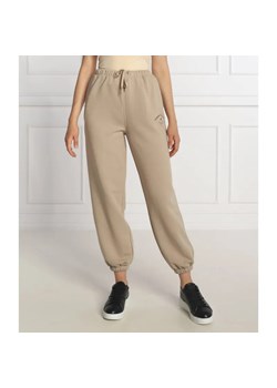 Tommy Sport Spodnie dresowe | Relaxed fit ze sklepu Gomez Fashion Store w kategorii Spodnie damskie - zdjęcie 184504826