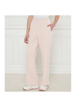 Guess Jeans Spodnie dresowe TRICOT | Relaxed fit ze sklepu Gomez Fashion Store w kategorii Spodnie damskie - zdjęcie 184505106