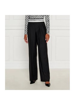Marc Cain Spodnie chino | flare fit | z dodatkiem wełny ze sklepu Gomez Fashion Store w kategorii Spodnie damskie - zdjęcie 184506385