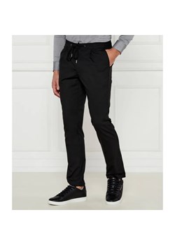 Michael Kors Spodnie | Tapered | stretch ze sklepu Gomez Fashion Store w kategorii Spodnie męskie - zdjęcie 184507667