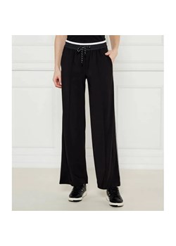 Marc Cain Spodnie Welcom | flare fit ze sklepu Gomez Fashion Store w kategorii Spodnie damskie - zdjęcie 184509036