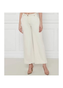 Marciano Guess Spodnie NAOMI | flare fit ze sklepu Gomez Fashion Store w kategorii Spodnie damskie - zdjęcie 184509636