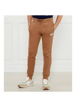 Tommy Hilfiger Spodnie dresowe | Regular Fit ze sklepu Gomez Fashion Store w kategorii Spodnie chłopięce - zdjęcie 184510338