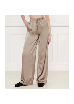 GUESS Satynowe spodnie INES | flare fit ze sklepu Gomez Fashion Store w kategorii Spodnie damskie - zdjęcie 184511349